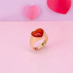 ANEL CORAÇÃO DOURADO PEDRA CABOCHÃO LISO