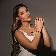 ANEL DE REGULAGEM DOURADO EM HEMATITA OVAL DUAS PEDRAS