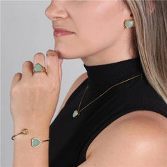 ANEL CORAÇÃO DOURADO PEDRA CHAPA COM ZIRCÔNIAS E RÓDIO BRANCO