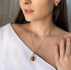 BRINCO GOTA CABOCHÃO 11x17 DOURADO