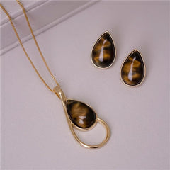 BRINCO GOTA CABOCHÃO 11x17 DOURADO