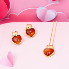BRINCO CORAÇÃO DOURADO PEDRA CABOCHÃO DETALHE MINIMALISTA