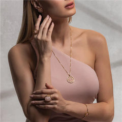 BRINCO TRAMA DOURADO PEDRA OVAL