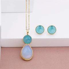 BRINCO DOURADO PEDRA CABOCHÃO 12MM