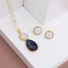BRINCO DOURADO PEDRA CABOCHÃO 12MM