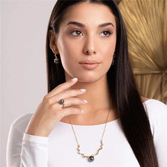 BRINCO TORCIDO PÉROLAS DOURADO