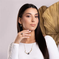 BRINCO TORCIDO PÉROLAS DOURADO
