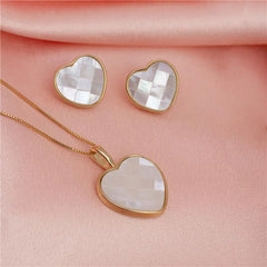 BRINCO CORAÇÃO EM PEDRA MADREPÉROLA DOURADO