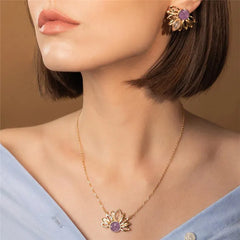 BRINCO GIRASSOL DOURADO COM DETALHES EM PEDRA NATURAL FRAGMENTADA