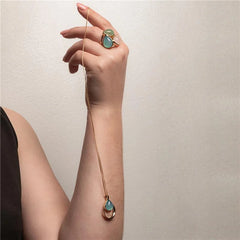 CONJUNTO BELLE DOURADO PEDRA GOTA