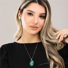 CONJUNTO DOURADO PEDRA OVAL ESMERALDA FACETADA