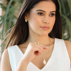 CONJUNTO DOURADO PEDRAS CONCHAS FACETADAS