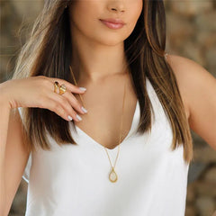 CONJUNTO DOURADO PEDRAS CONCHAS FACETADAS