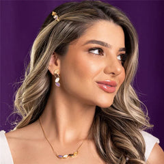CONJUNTO DOURADO COM QUATRO PEDRAS FRAGMENTADAS