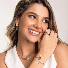 CONJUNTO DOURADO COM QUATRO PEDRAS FRAGMENTADAS