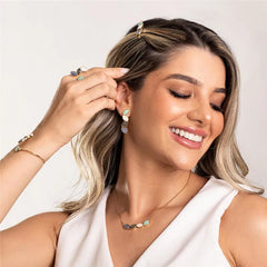CONJUNTO DOURADO COM QUATRO PEDRAS FRAGMENTADAS