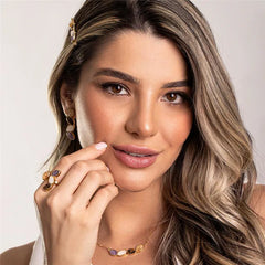 CONJUNTO DOURADO COM QUATRO PEDRAS FRAGMENTADAS