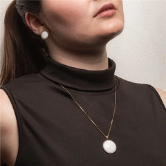 CONJUNTO DOURADO COM RÓDIO BRANCO PEDRA REDONDA LISA