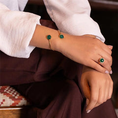 PULSEIRA SINGULAR DOURADO DUAS PEDRAS FORMATO REDONDO