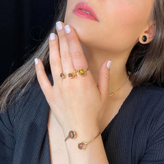 PULSEIRA SINGULAR DOURADO DUAS PEDRAS FORMATO REDONDO
