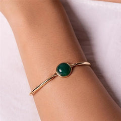 PULSEIRA AJUSTÁVEL PEDRA REDONDA NATURAL CABOCHÃO DOURADO