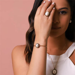 PULSEIRA PÉROLAS DOURADO COM RODIO NEGRO OVAL