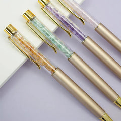 CANETA DOURADA COM TINTA PRETA E PEDRA NATURAL