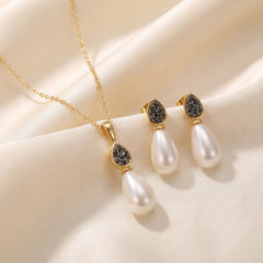 CONJUNTO DOURADO PÉROLA GOTA COM DETALHES FRAGMENTADOS