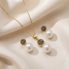 CONJUNTO DOURADO PÉROLA COM DETALHES FRAGMENTADOS