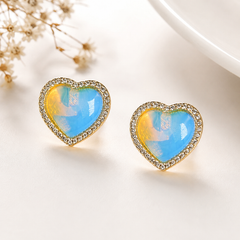 BRINCO CORAÇÃO DOURADO RÓDIO BRANCO PEDRA CABOCHÃO